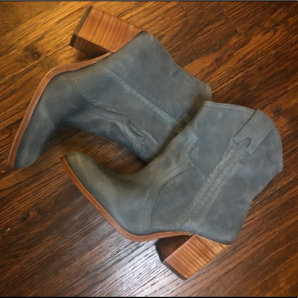 Light blue heeled booties.